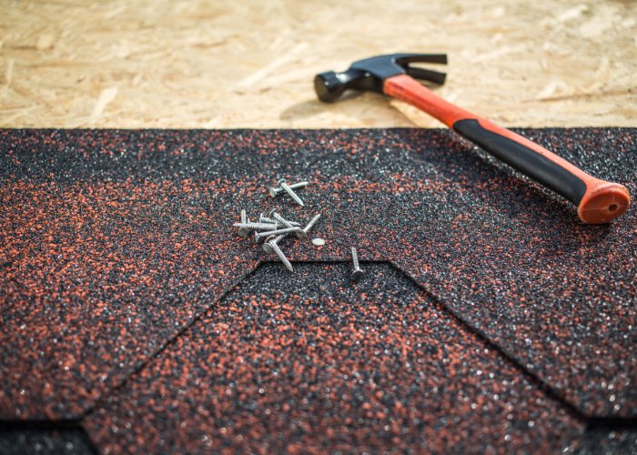 roof repair in RI - roofing hammer & nails
