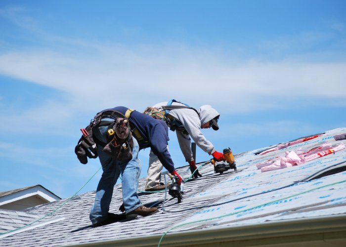 replacing a Rhode Island roof - by two roofing contractors